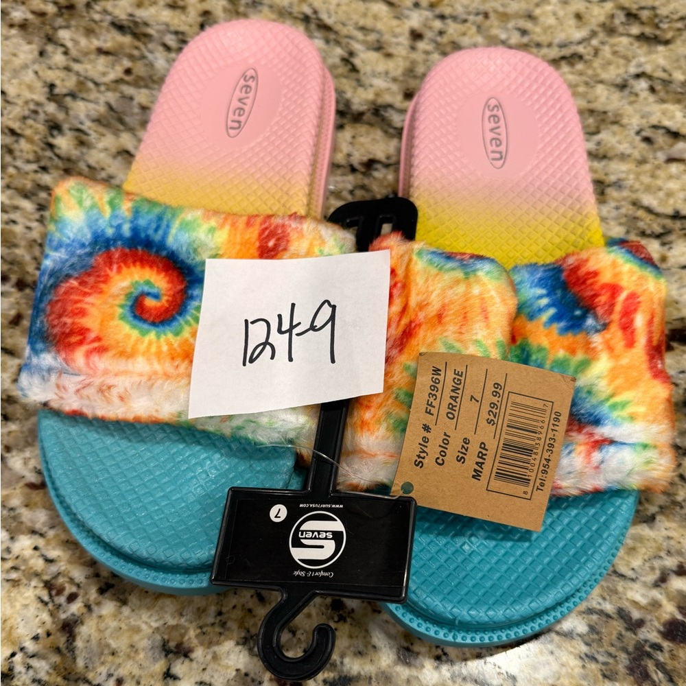 Seven tie dyed faux fur rainbow colored slides Size 7